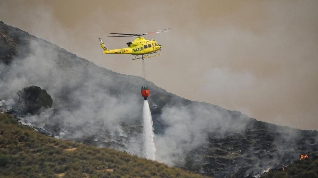 Spain wildfire kills at least 11 in Almería as firefighters battle flames and hundreds flee amid extreme heat.