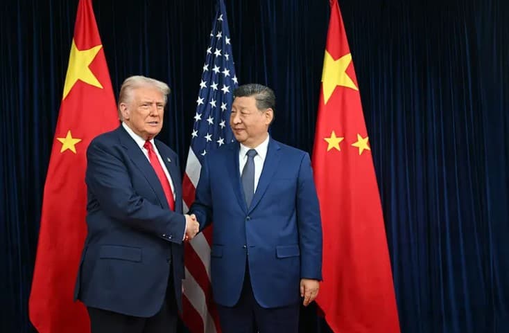 U.S. President Donald Trump shakes hands with China President Xi Jinping at the Gimhae Air Base in Busan, South Korea, on Oct. 30, 2025.