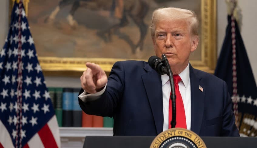 US President Donald Trump speaking during a press conference amid rising tensions and stalled negotiations with Iran
